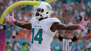 Dolphins wideout Jarvis Landry celebrates in front of the home crowd after scoring a touchdown during the 2015 season.